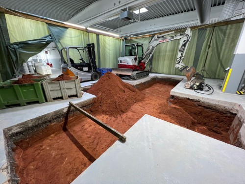 Schadstoffsanierung mit Schwarzweiß-Bereich und Bodenaushub in Saarbrücken